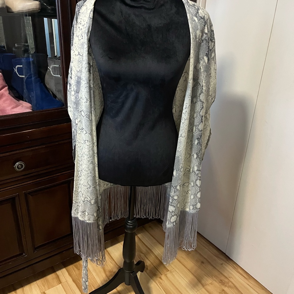 Classy, unique swimsuit coverup.